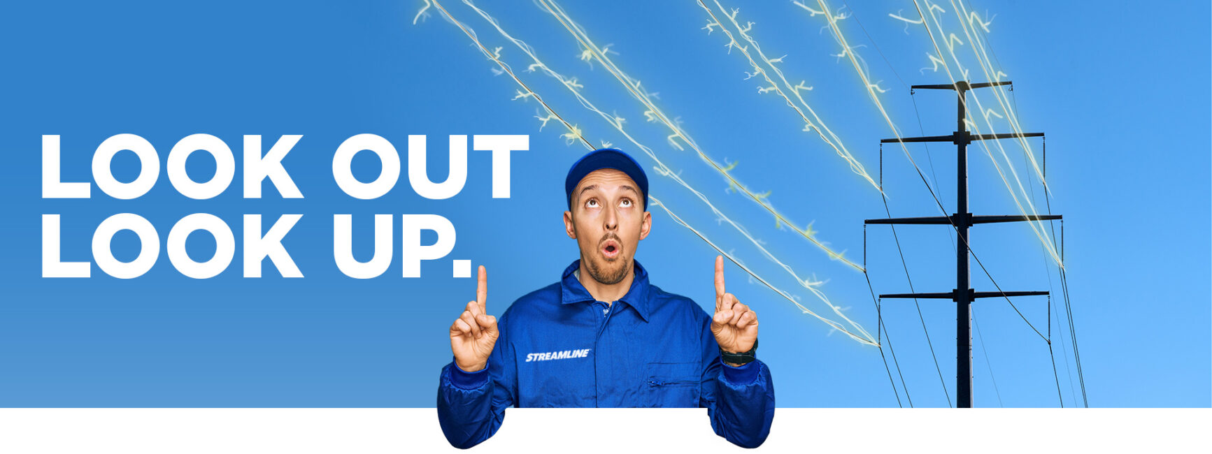 Man looking up at over head power lines with text that says "Look Out Look up"